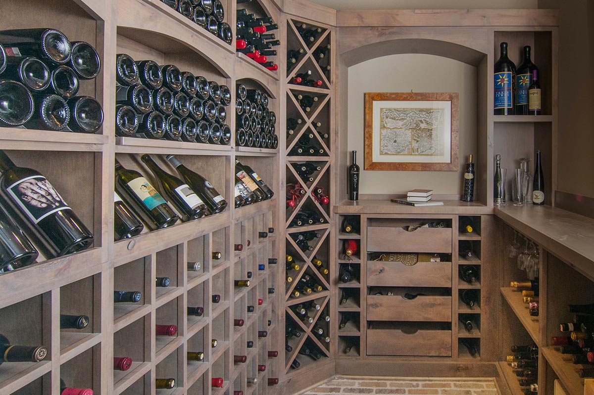 Custom wine room with floor to ceiling bottle racking