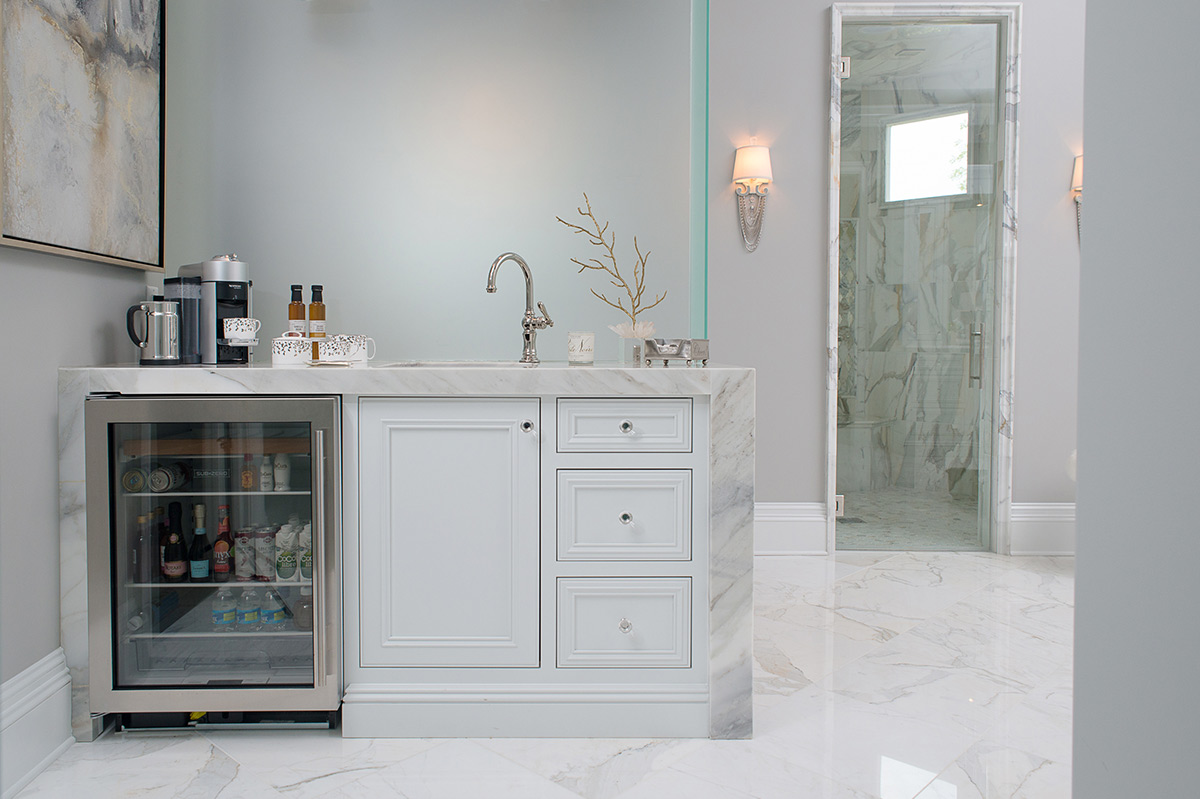 Custom coffee bar cabinetry with a beverage cooler
