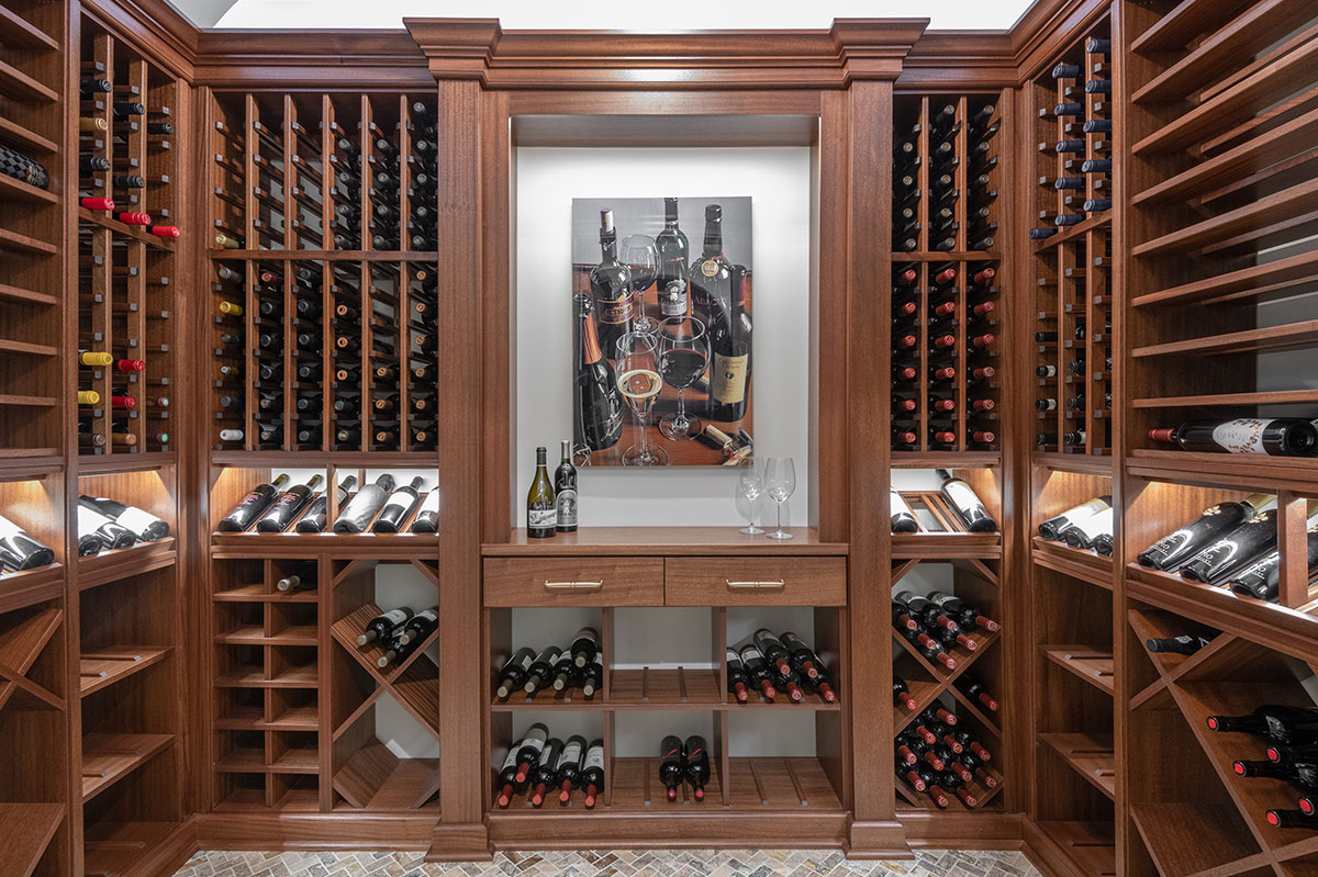 Custom wine room with stained wood racking and display shelving